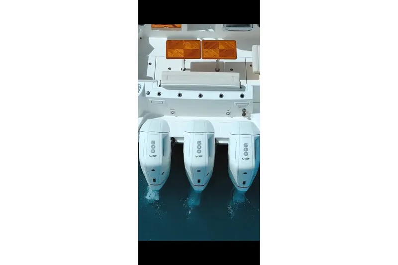  Yacht Photos Pics 2024 Boston Whaler 405 Conquest with triple V12 engines, viewed from above.