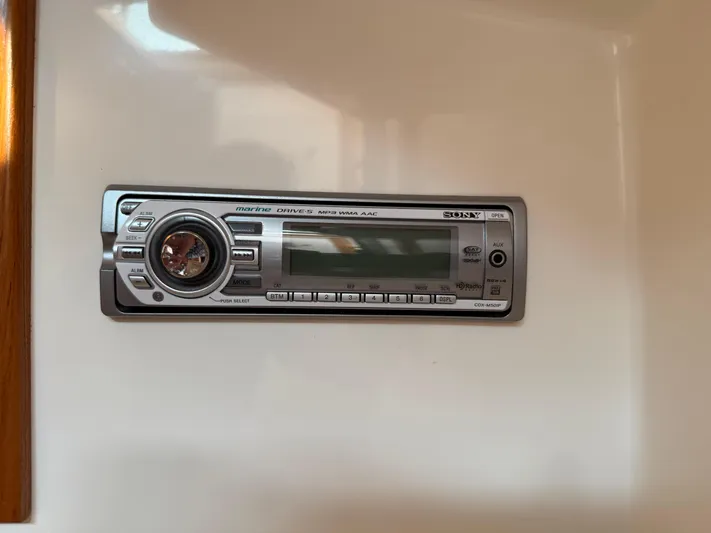 Club Car Yacht Photos Pics Sony marine stereo system in a 1999 Cabo 31 Express boat interior.