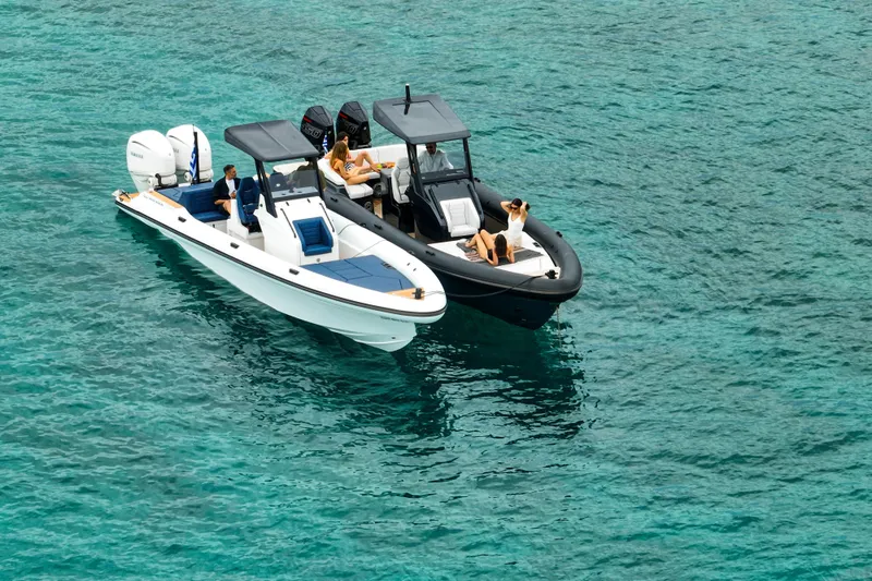 Rock Marine Rm 36 U | 36 S Yacht Photos Pics Two Rock Marine RM 36 boats, 2026 model, floating on clear turquoise water.