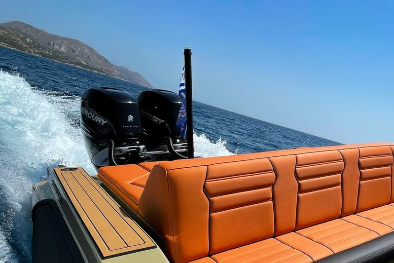 Rock Marine Rm 36 U | 36 S Yacht Photos Pics 2026 Rock Marine RM 36 boat with orange seating, cruising on open water.