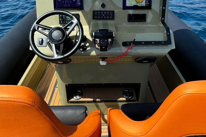 Rock Marine Rm 36 U | 36 S Yacht Photos Pics 2026 Rock Marine RM 36 boat cockpit with orange seats and modern controls.