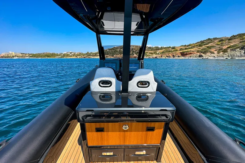 Rock Marine Rm 36 U | 36 S Yacht Photos Pics 2026 Rock Marine RM 36 boat interior with sleek design on clear blue water.