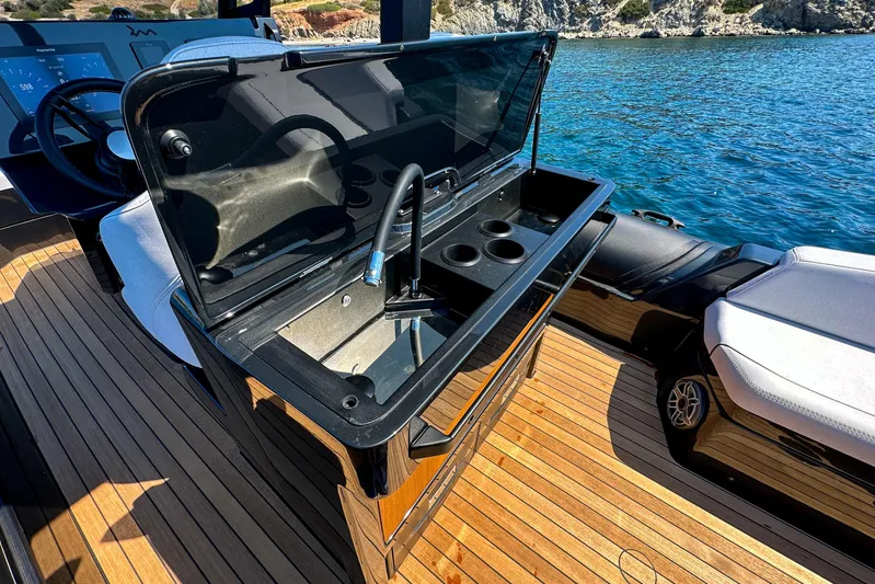Rock Marine Rm 36 U | 36 S Yacht Photos Pics Luxury yacht RM 36 by Rock Marine, featuring a sleek onboard sink and wooden deck, 2026 model.