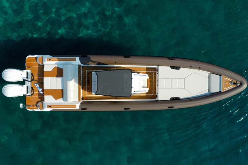 Rock Marine Rm 36 U | 36 S Yacht Photos Pics Aerial view of 2026 Rock Marine RM 36 boat on clear blue water.