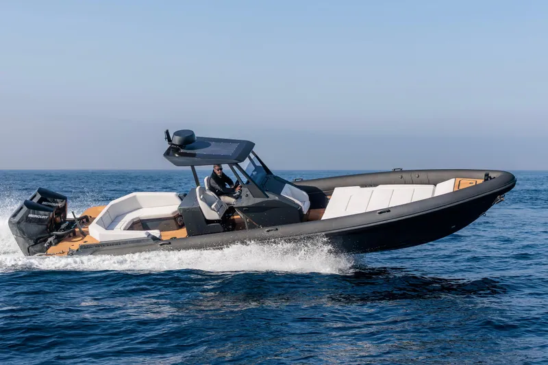 Rock Marine Rm 36 U | 36 S Yacht Photos Pics 2026 Rock Marine RM 36 speedboat cruising on open water, showcasing sleek design and performance.