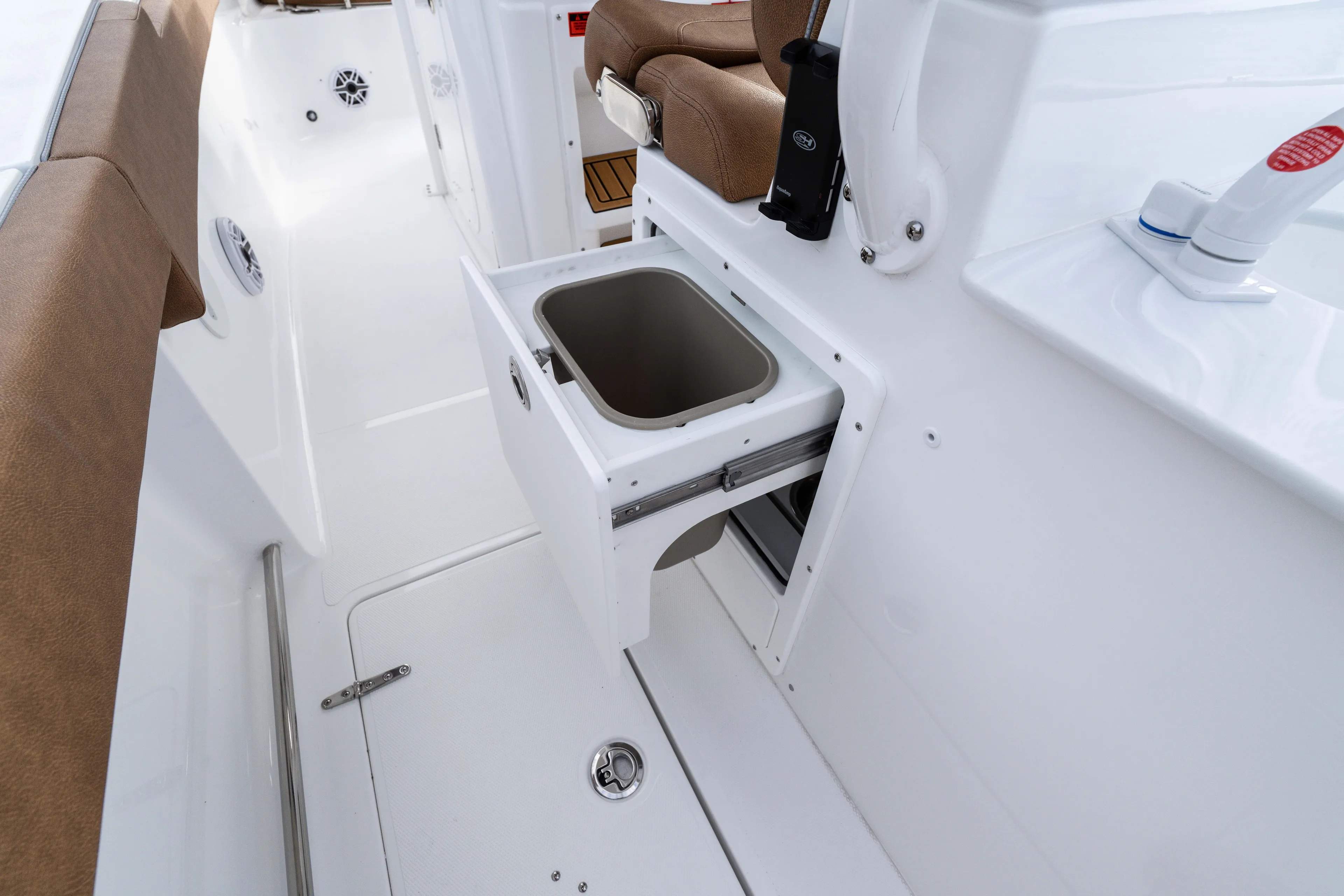  Yacht Photos Pics 2026 Sea Hunt Ultra 285 SE boat interior with pull-out storage compartment.