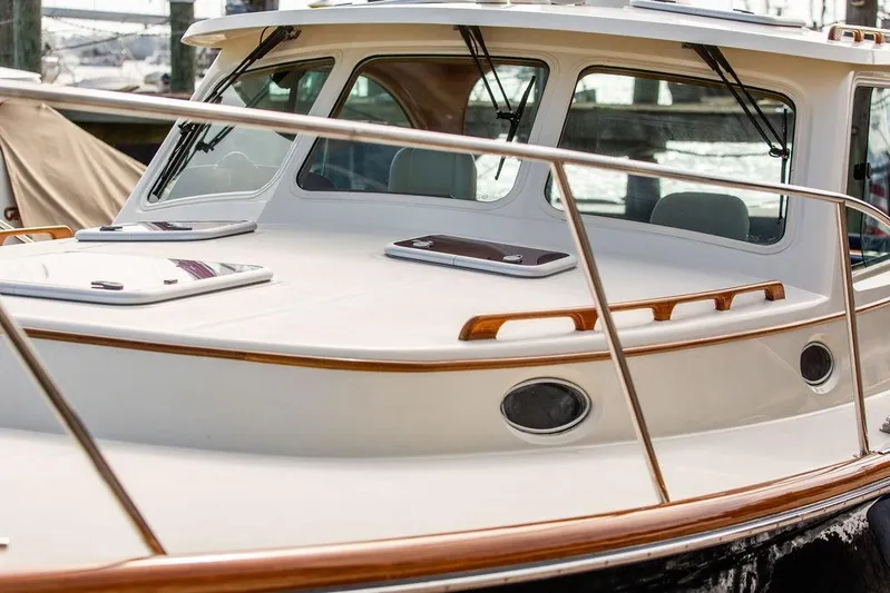 Swift Yacht Photos Pics 2005 Hinckley Talaria 40 yacht with sleek design and polished wood accents.