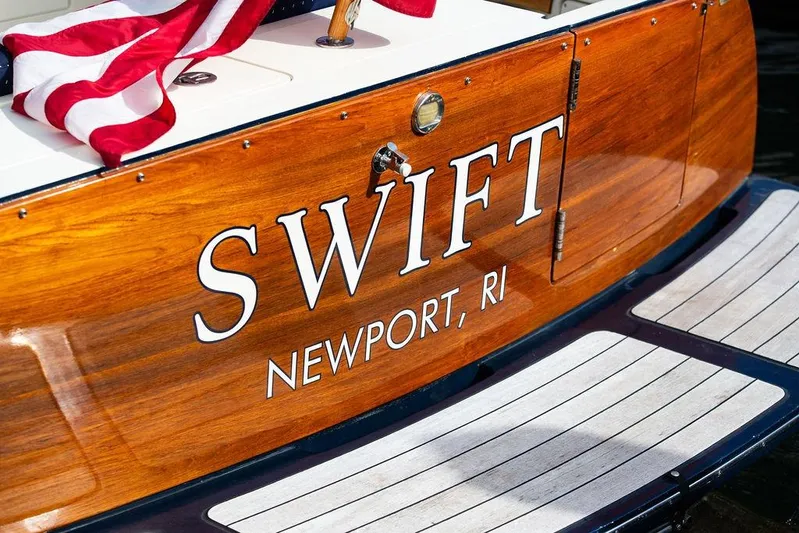 Swift Yacht Photos Pics 2005 Hinckley Talaria 40 boat named "Swift" in Newport, RI, with American flag.