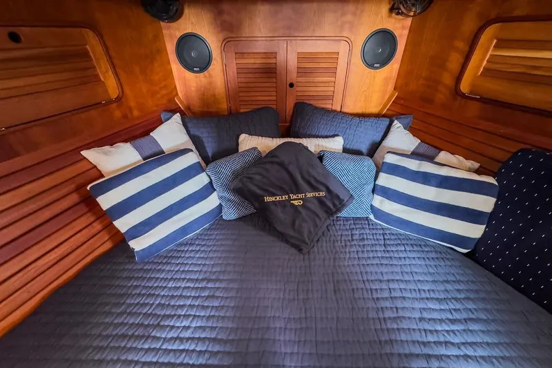 Swift Yacht Photos Pics Luxurious cabin interior of 2005 Hinckley Talaria 40 yacht with striped pillows.