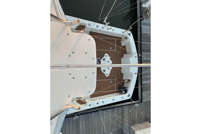 Reel Carolina II Yacht Photos Pics 2002 Out Island 38 Express Fisherman boat deck, aerial view, docked at marina.