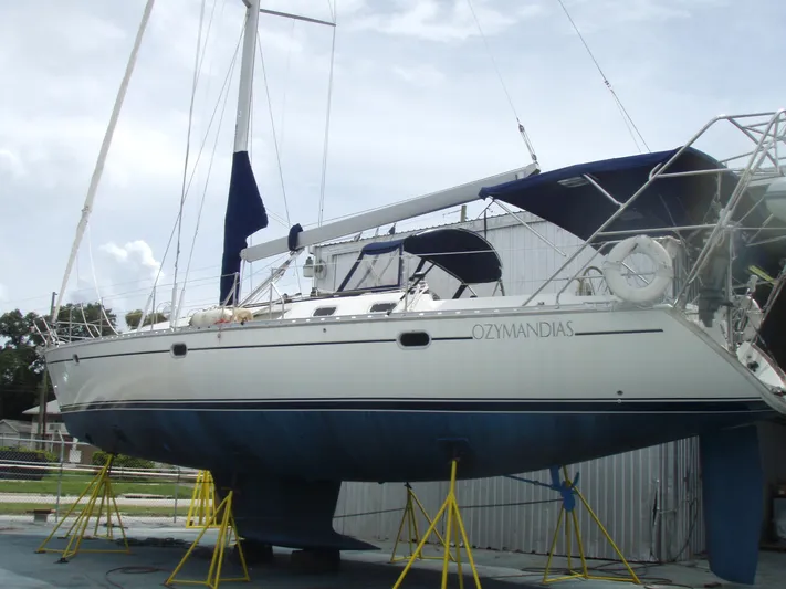 Ozymandias Yacht Photos Pics Sailboat Jeanneau 45.2, 2001 model, on stands in a boatyard.
