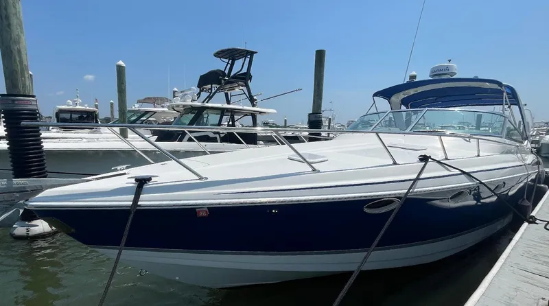 Sol Mate Yacht Photos Pics 2003 Formula 370 SS boat docked at marina under clear blue sky.