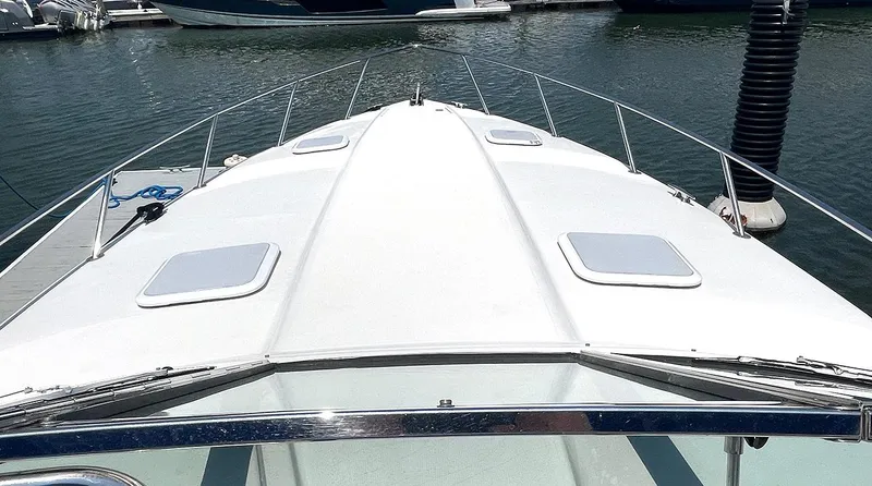 Sol Mate Yacht Photos Pics 2003 Formula 370 SS boat docked at marina, viewed from bow.