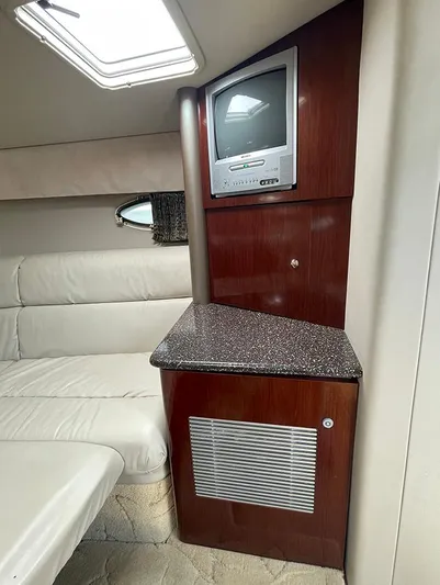 Sol Mate Yacht Photos Pics 2003 Formula 370 SS cabin interior with TV and seating area.
