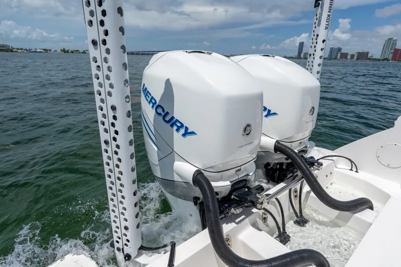  Yacht Photos Pics Twin Mercury outboard engines on a 2021 Intrepid 345 Nomad FE boat in open water.