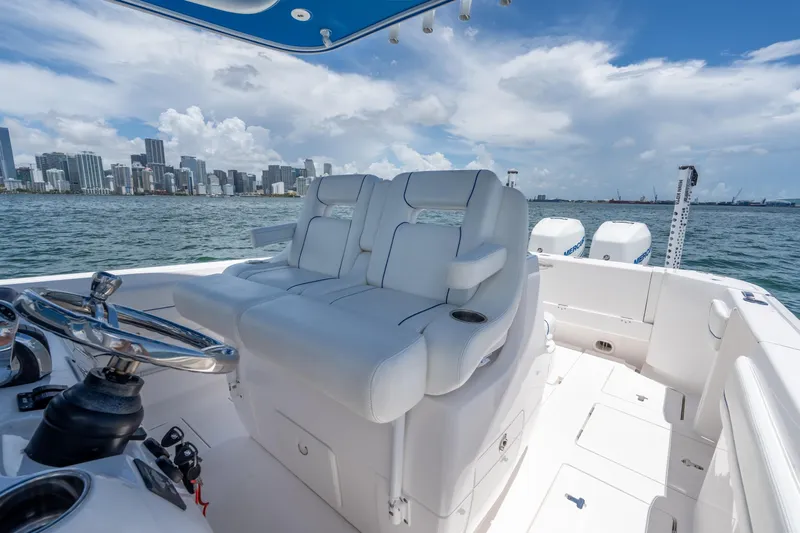  Yacht Photos Pics 2021 Intrepid 345 Nomad FE boat interior with city skyline in background.
