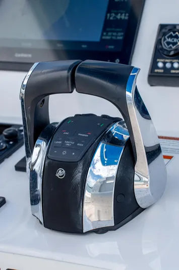  Yacht Photos Pics Throttle controls on a 2021 Intrepid 345 Nomad FE boat dashboard.