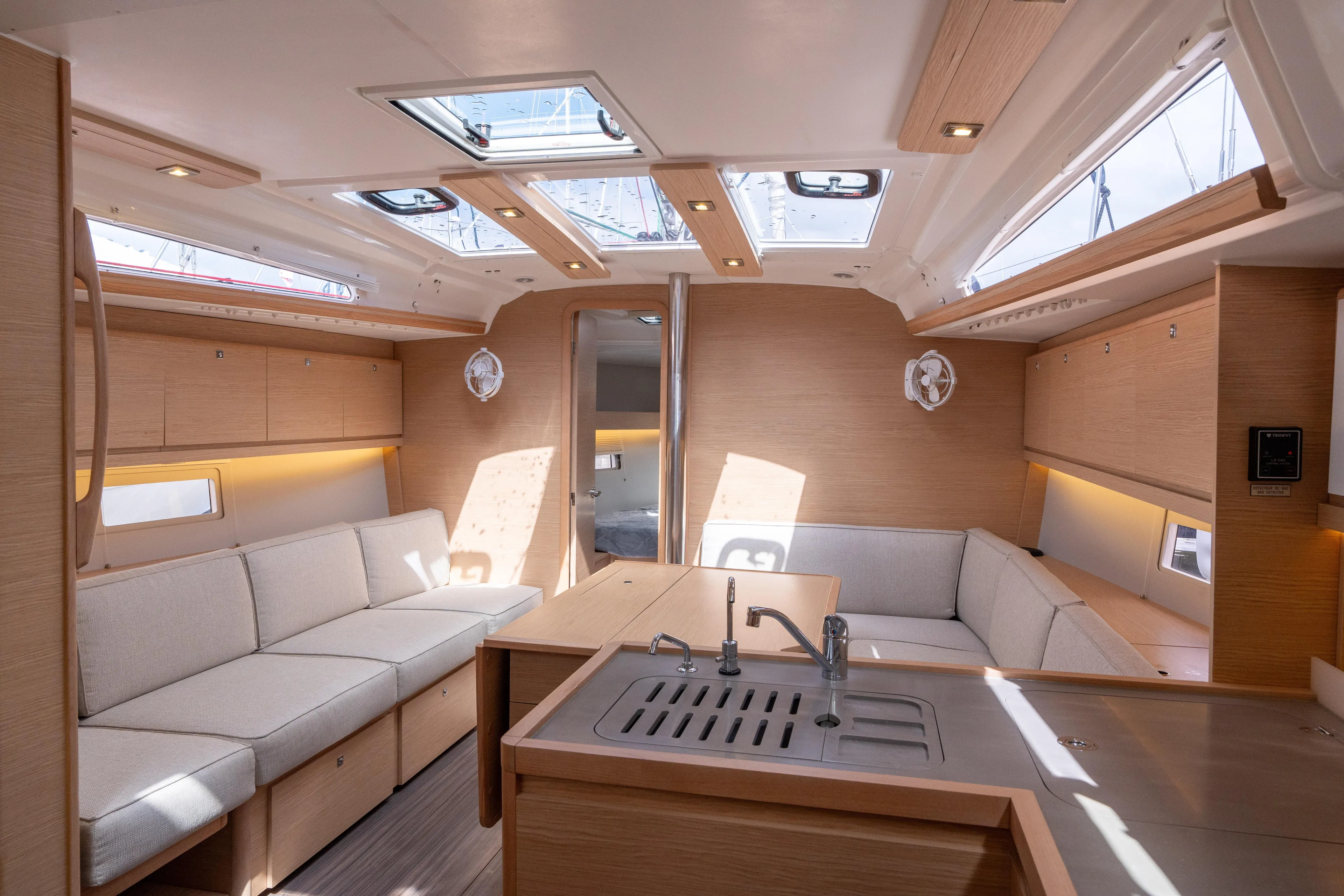 Lunar Sea Yacht Photos Pics Luxurious interior of 2023 Dufour 390 yacht with modern design and ample natural light.