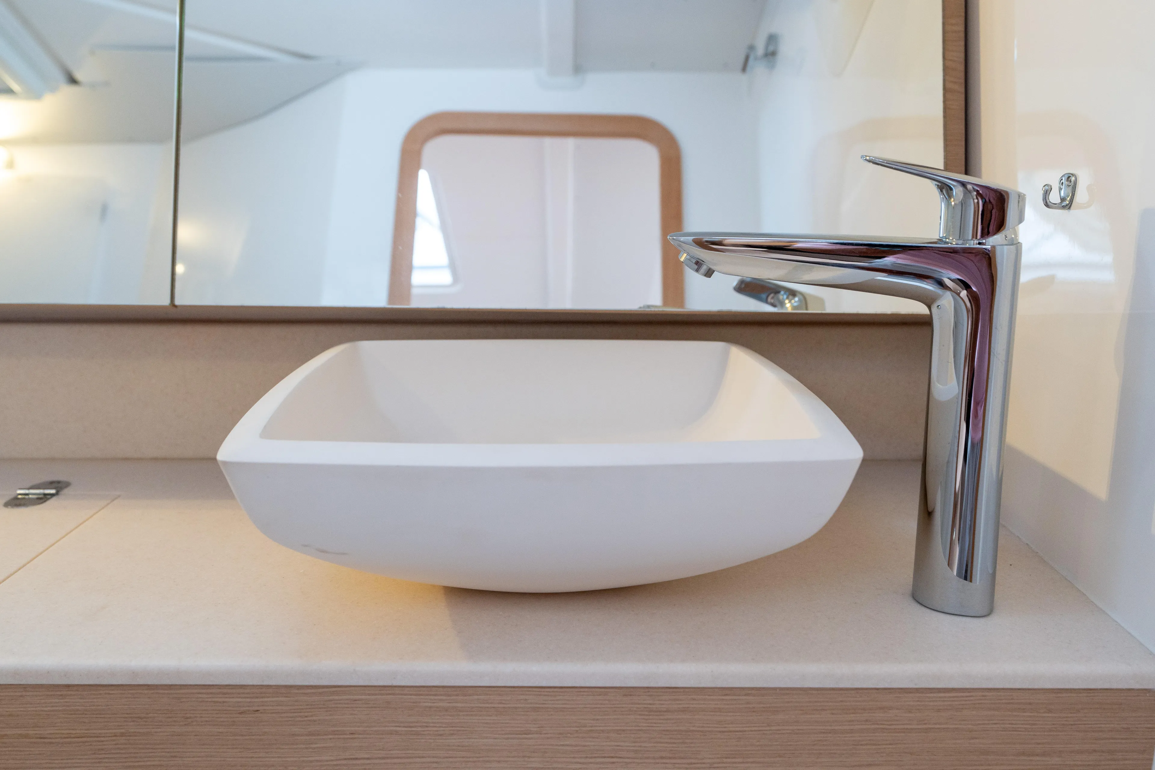 Lunar Sea Yacht Photos Pics Modern bathroom sink and faucet on 2023 Dufour 390 yacht.