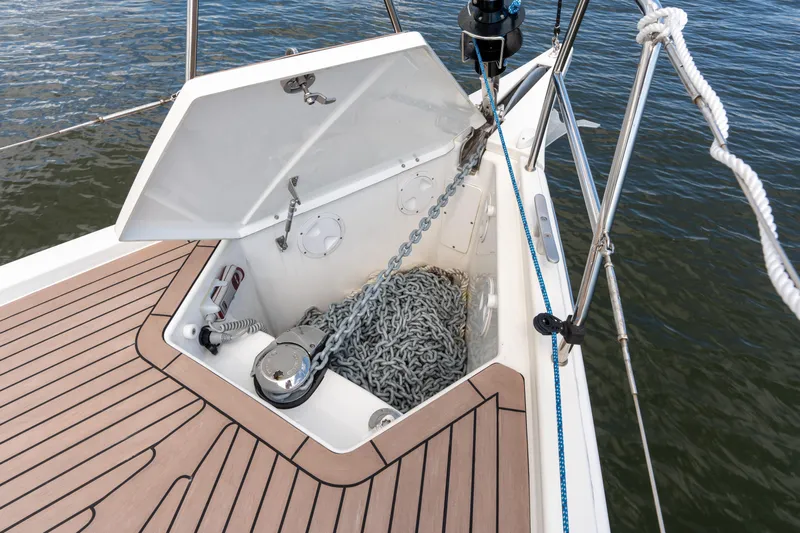 Lunar Sea Yacht Photos Pics 2023 Dufour 390 sailboat anchor locker with chain and winch on deck.