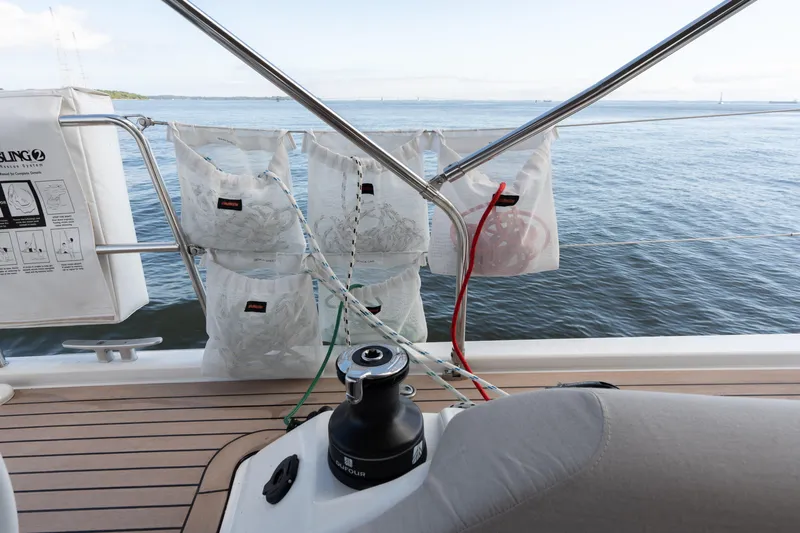 Lunar Sea Yacht Photos Pics 2023 Dufour 390 yacht deck with winch, ropes, and ocean view.