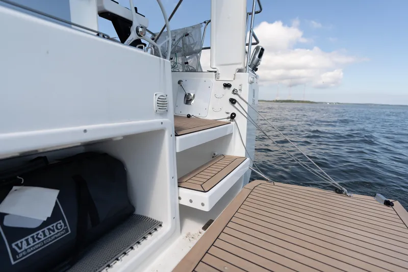 Lunar Sea Yacht Photos Pics 2023 Dufour 390 yacht deck with steps and Viking equipment bag.