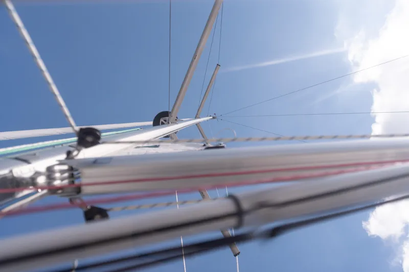 Lunar Sea Yacht Photos Pics View of Dufour 390 sailboat mast against blue sky, 2023 model.