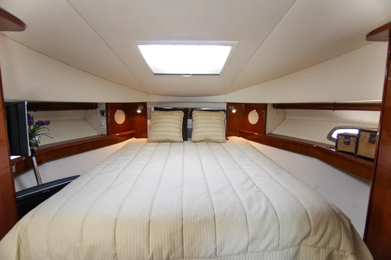 Morena Yacht Photos Pics Luxurious cabin interior of 2008 Sea Ray 48 Sundancer yacht with cozy bedding.