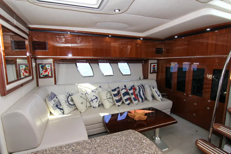 Morena Yacht Photos Pics Luxurious interior of 2008 Sea Ray 48 Sundancer yacht with plush seating and nautical decor.