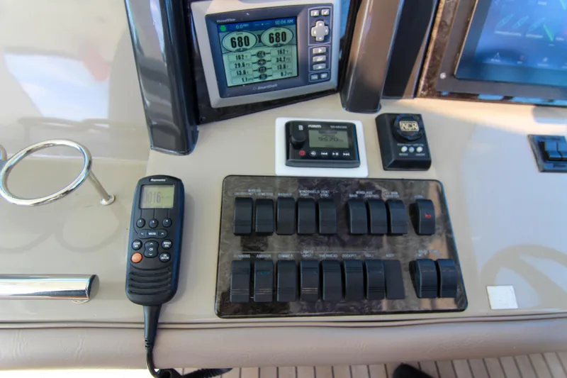 Morena Yacht Photos Pics Control panel of a 2008 Sea Ray 48 Sundancer yacht with navigation instruments.