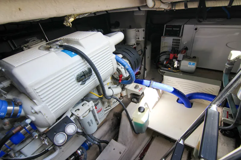 Morena Yacht Photos Pics Engine room of 2008 Sea Ray 48 Sundancer yacht, showcasing mechanical components and systems.