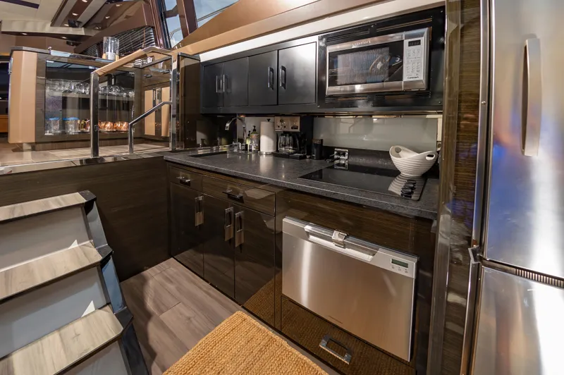 Docked Wages Yacht Photos Pics Modern kitchen in 2013 Marquis 63 Sport Yacht with sleek appliances and cabinetry.