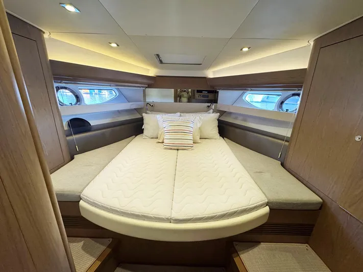 Wanderlust Yacht Photos Pics Luxurious cabin interior of 2015 Beneteau Gran Turismo 44 yacht with cozy bedding.