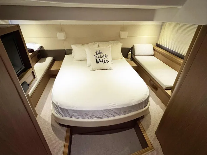 Wanderlust Yacht Photos Pics Luxurious bedroom interior of 2015 Beneteau Gran Turismo 44 yacht with cozy bed and seating.