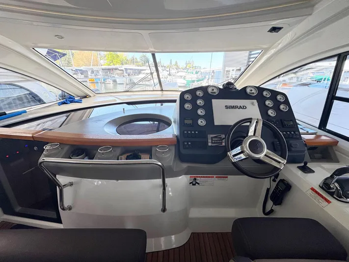 Wanderlust Yacht Photos Pics Helm of 2015 Beneteau Gran Turismo 44 yacht with Simrad navigation system.
