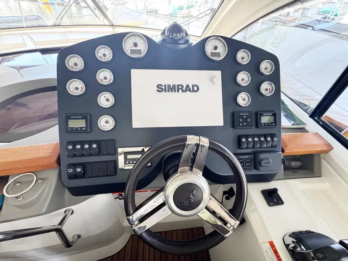Wanderlust Yacht Photos Pics Helm of 2015 Beneteau Gran Turismo 44 with Simrad navigation system and gauges.