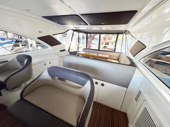 Wanderlust Yacht Photos Pics Interior of 2015 Beneteau Gran Turismo 44 yacht, featuring sleek seating and modern design.