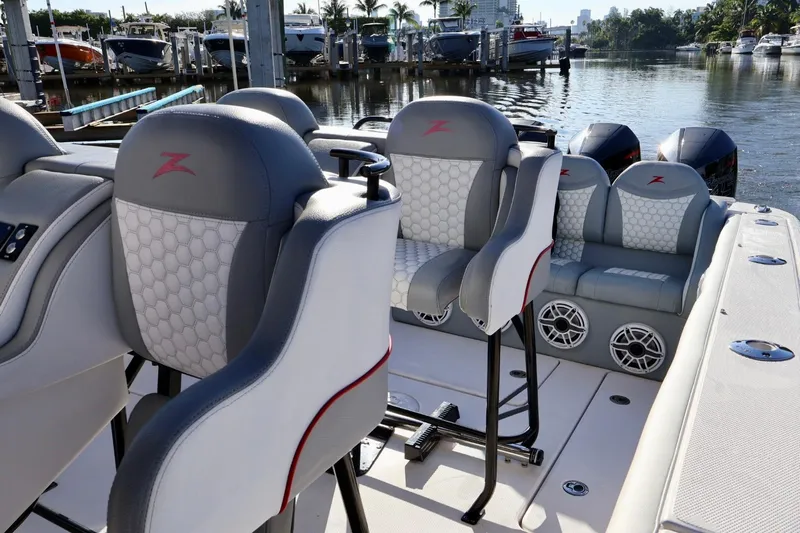  Yacht Photos Pics 2012 Donzi 38 ZF Open boat interior with stylish seating and waterfront view.