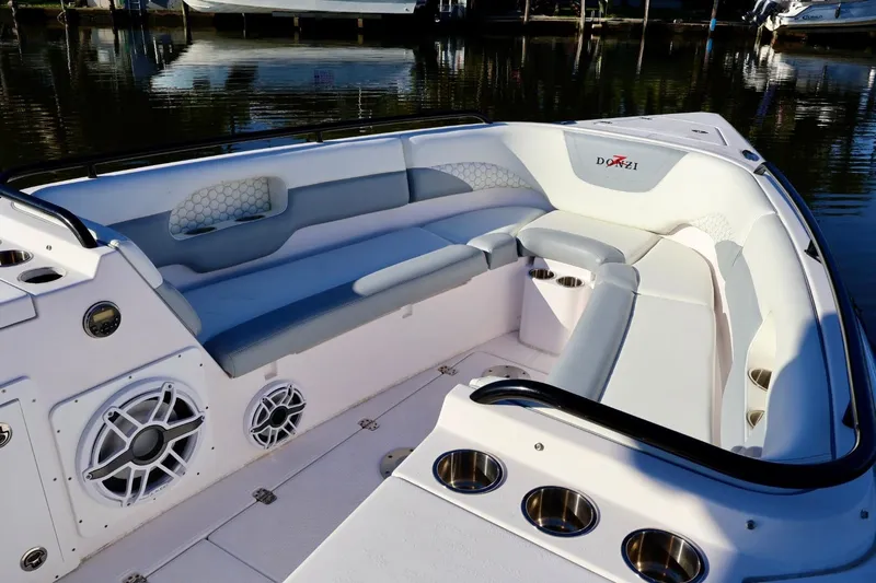  Yacht Photos Pics 2012 Donzi 38 ZF Open boat interior with cushioned seating and cup holders.
