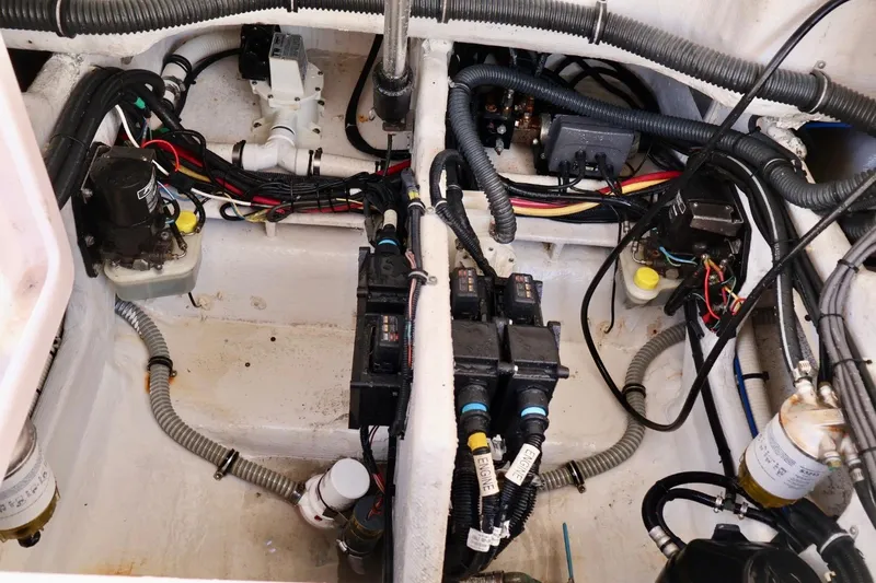  Yacht Photos Pics Engine compartment of a 2012 Donzi 38 ZF Open boat, showing wiring and components.