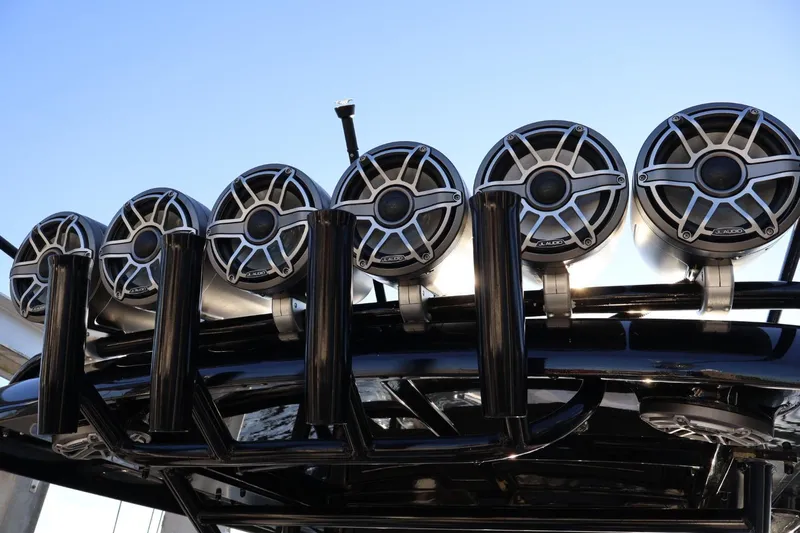  Yacht Photos Pics Speakers on a 2012 Donzi 38 ZF Open boat against a clear blue sky.