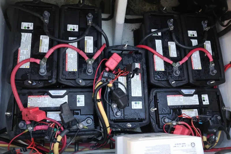  Yacht Photos Pics Battery setup in a 2012 Donzi 38 ZF Open boat, featuring multiple connected units.