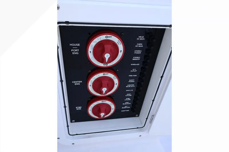  Yacht Photos Pics Control panel of a 2012 Donzi 38 ZF Open boat with red switches.