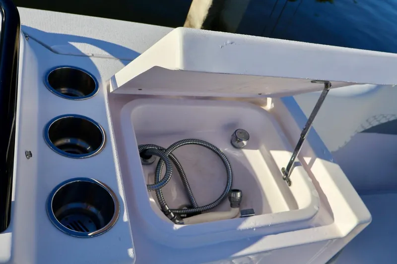  Yacht Photos Pics 2012 Donzi 38 ZF Open boat sink and cup holders on deck.