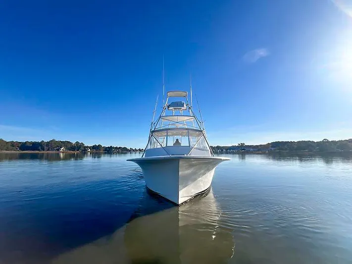 Precedent Yacht Photos Pics Jersey Cape 36 Express 1998 on calm water under clear sky.