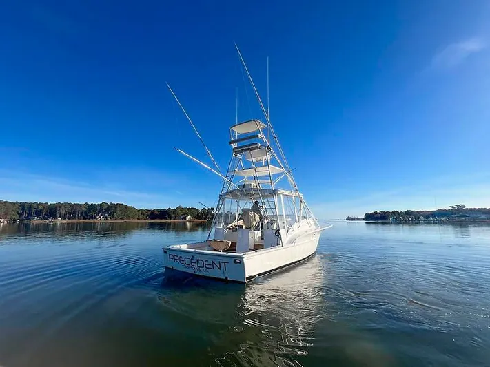 Precedent Yacht Photos Pics 1998 Jersey Cape 36 Express boat on calm water.