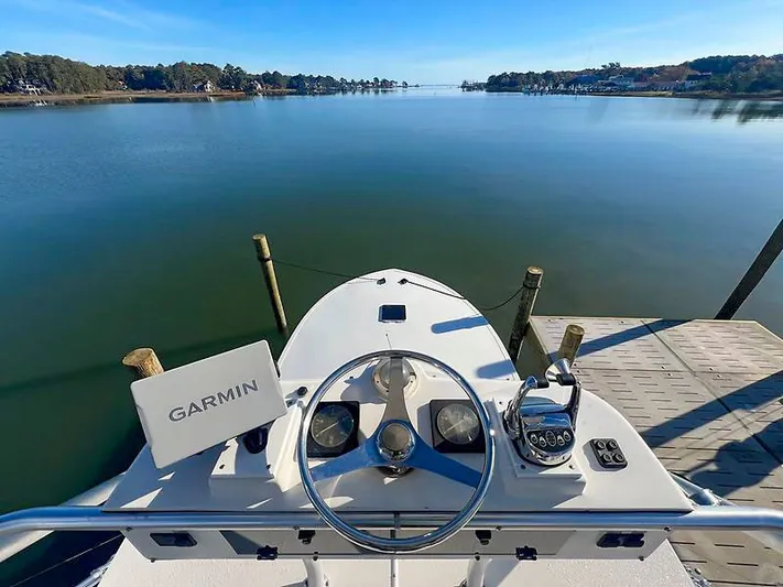 Precedent Yacht Photos Pics Jersey Cape 36 Express 1998 helm with Garmin on calm waters.