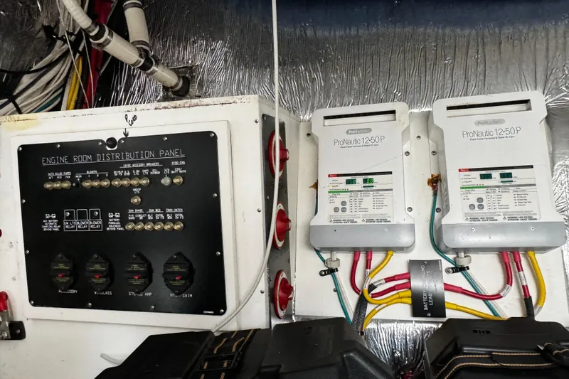  Yacht Photos Pics Engine room distribution panel and ProNautic chargers on 2014 Cruisers Yachts 45 Cantius.