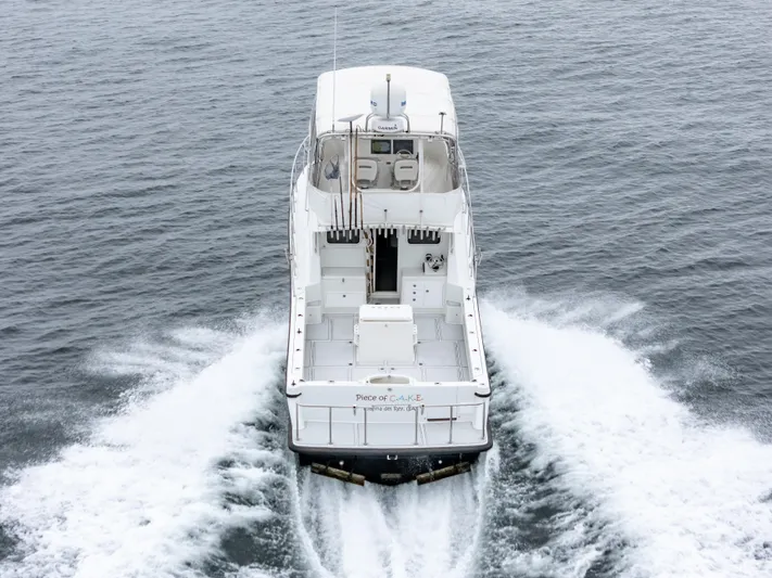  Yacht Photos Pics Aerial view of 2018 Lindell 46 F boat cruising on open water.