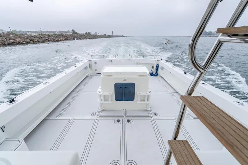  Yacht Photos Pics Lindell 46 F 2018 boat cruising on open water, spacious deck view.